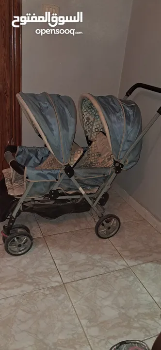 عربة أطفال توأم مستعمل بحالة جيدة  ماركة MAMA LOVE