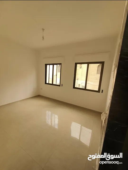 عماره جديده/4 شقق طابقيه للبيع