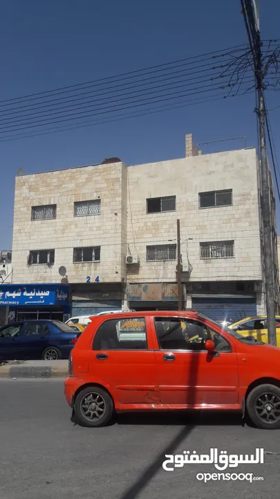 مجمع تجاري للإيجار بدون خلو في موقع مميز في الزرقاء حي معصوم الشارع الرئيسي جوار دوار معصوم