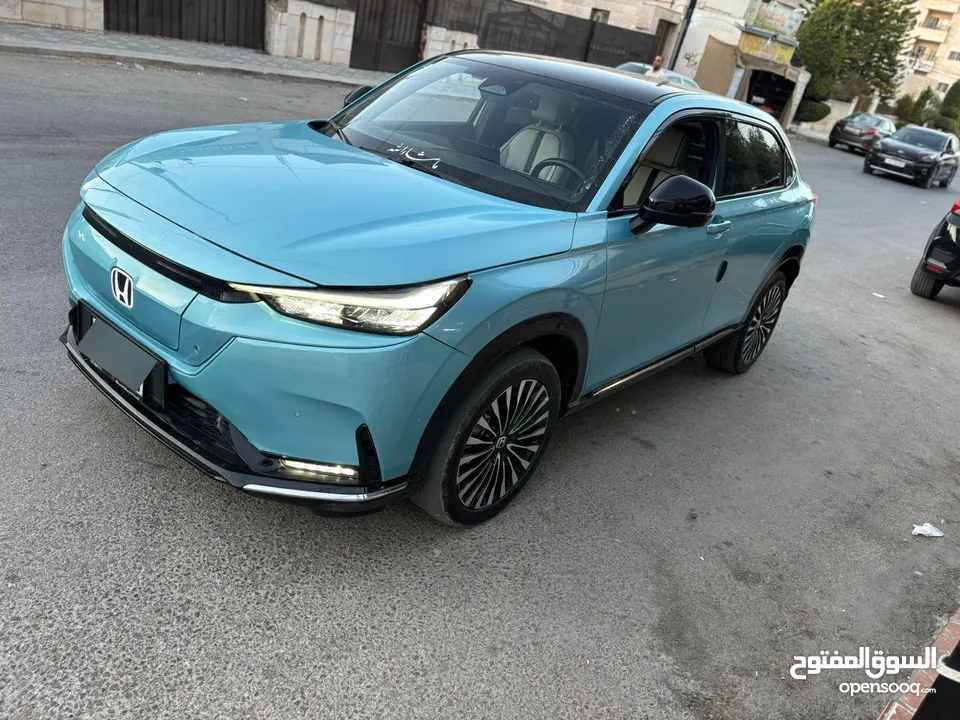 سياره هوندا  اس ون موديل 2023 اعلى مواصفات اللزن تركواز فل كهرباء بتمشي 450كيلو ىالشحنه نظيفه عالشرط