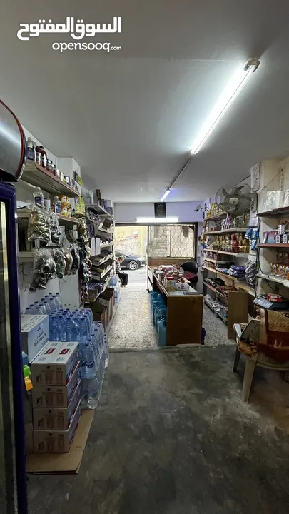 سوبر ماركت على الشارع الرئيسي في جبل الجوفة للبيع خلو