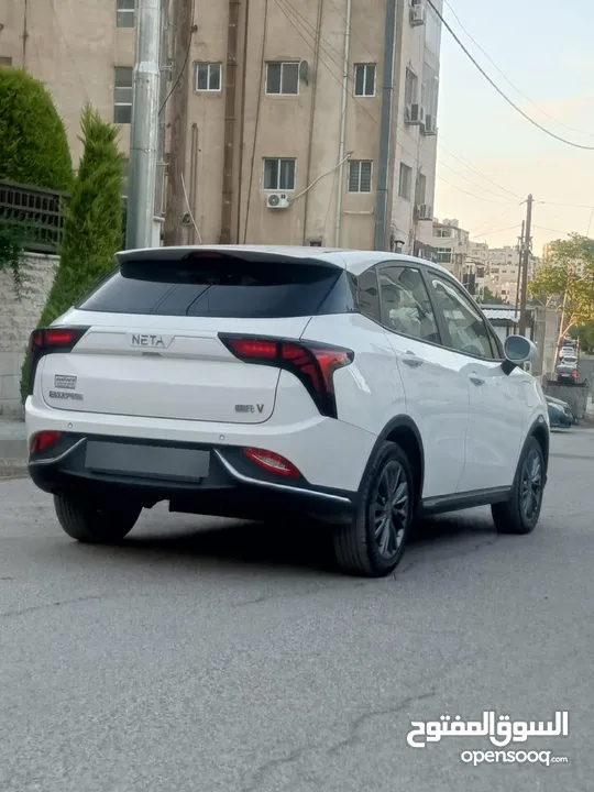 نيتا v موديل 2023 لون ابيض لؤلؤي فحص كامل جمرك حديث اتسكور 89% فحص soc 100% استخدام شخصي مثبت كارسير