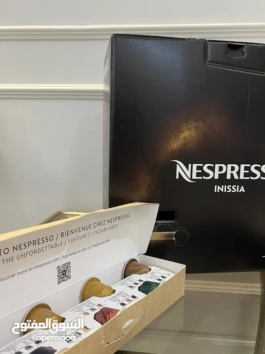 مكينه قهوه من شركه Nespressoجديده و مع ضمان من الشركه