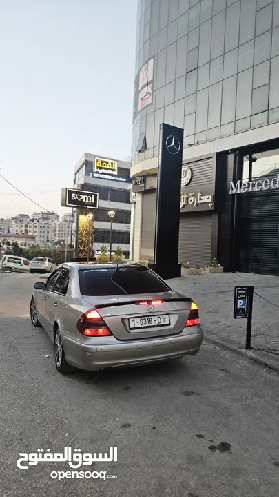 مرسيدس بنز W 211
