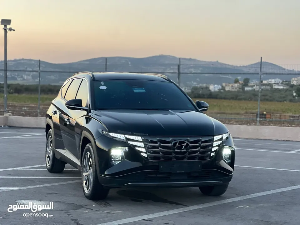 هونداي توسان/2022 فل الفل بدون فتحة سقف  2x4 ///240Hp بنزين + كهرباء  ( Haybrid) 1600cc