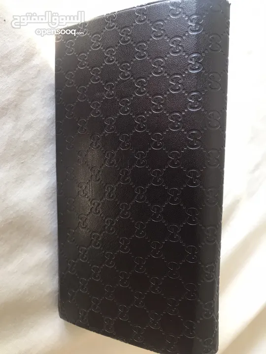 نظاره ماركه Gucci  اصليه  ايطاليه مع علبتها الاصليه ايضا