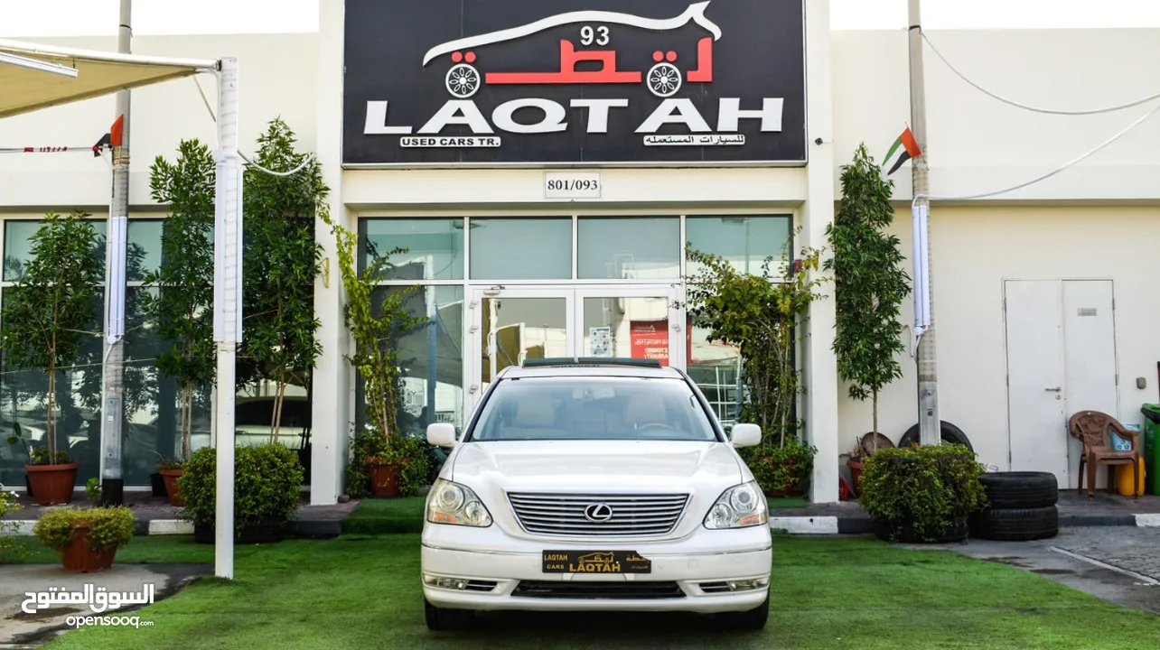 لكزس LS430 وارد 1/2 الترا موديل 2006 لون أبيض فتحة جلد رنجات خشب مرايا كهرباء بحالة ممتازة