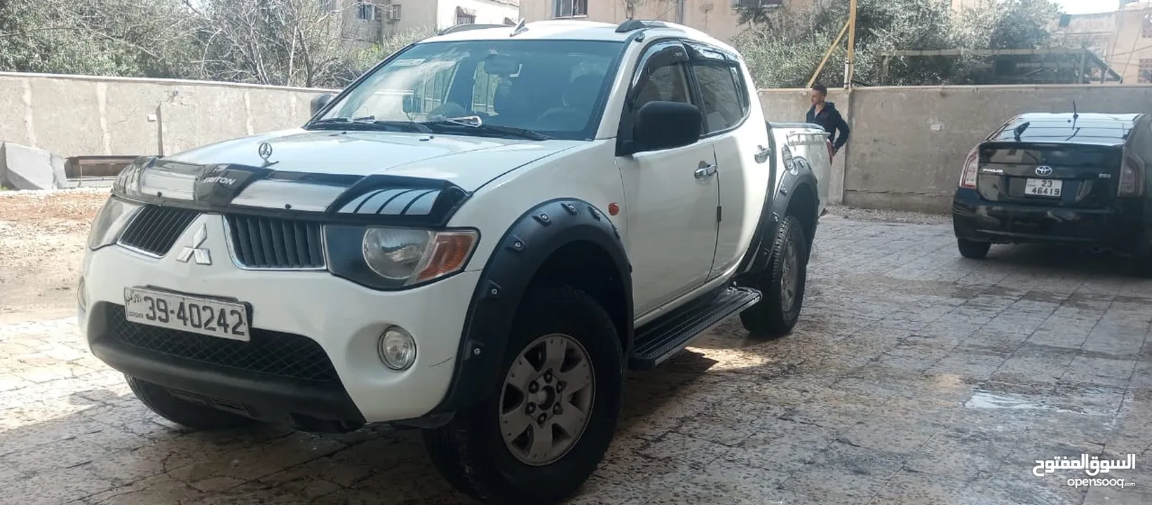 بيك اب ميتسوبيشي l200 موديل 2009