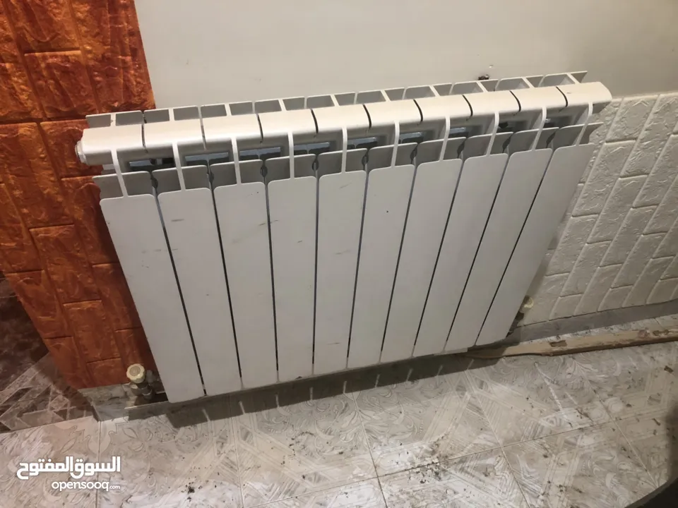 ماطور تدفئة مركزية مع خزان سولار مع الراديترات (المشعاعات)