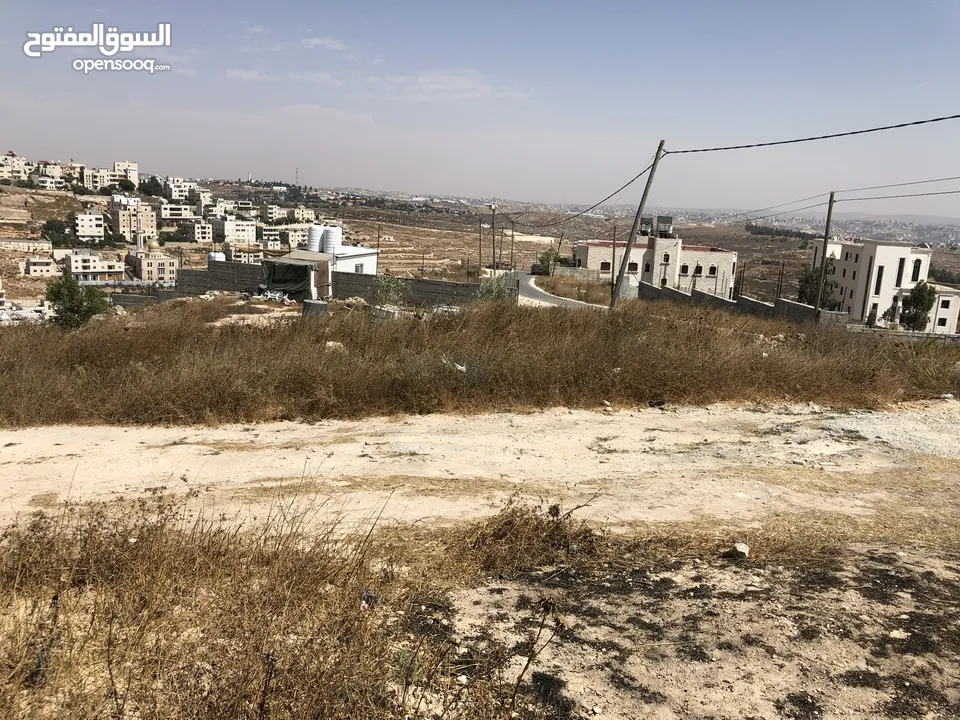 أرض طابو للبيع  بمساحة 881 متر مربع موقع استراتيجي على راس جبل باطلالة بانورامية