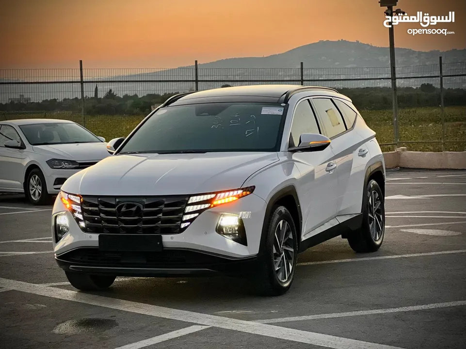 هونداي توسان 2023/ فل الفل فتحة سقف بانوراما  2x4 ///240Hp بنزين + كهرباء  ( Haybrid) 1600cc