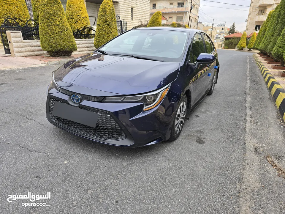 تويوتا كورولا 2021 ياباني بطارية ليثيوم قطعت مسافه 30 الف جمرك جديد بسعر مغري جدا