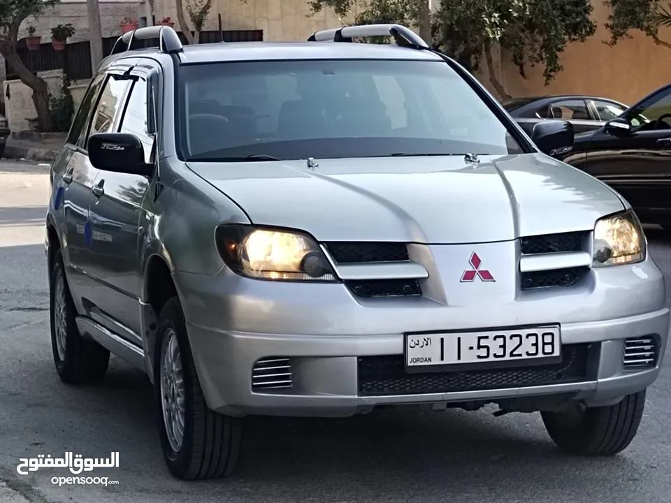 ميتسوبيشي آوتلاندر اوتوماتيك 2003 توب نظافة بسعرررر مميززز محرك 2400cc