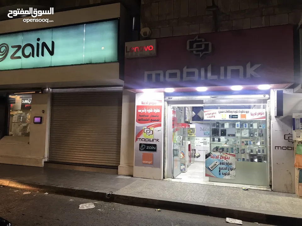 محل تجاري للبيع مجهز كامل موقع مميز ملاصق لمعرض شركة زين - شارع باب الواد - الوسط التجاري/ الزرقاء