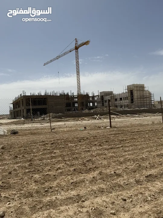ارض في الجيزه على شارعين مقابل مجمع الدوائر