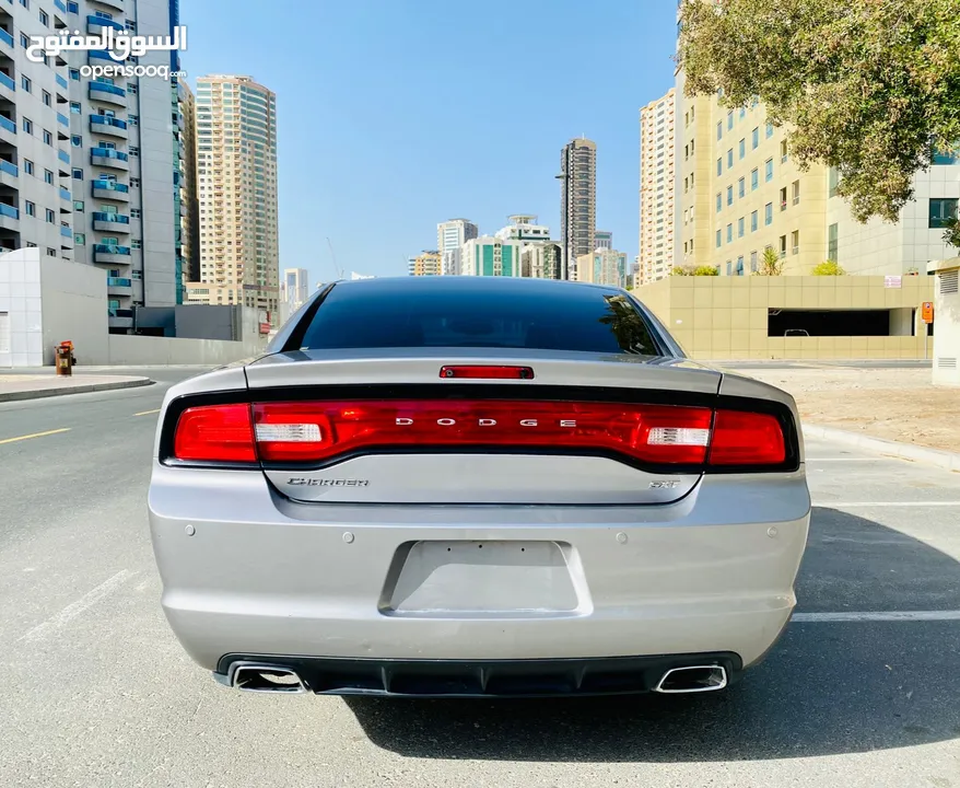 A Very Well Maintained DODGE CHARGER 2014 SILVER GCC SXT Edition With Sunroof