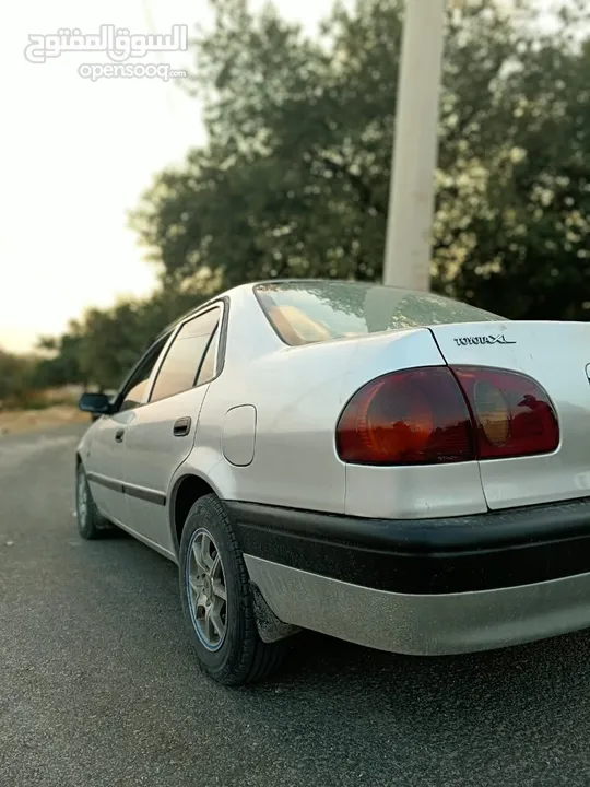 تويوتا كرولا 2000فل ماعدا الزجاج محرك 1300ccقطاره بنزين مكيف بور جير اتوماتيك