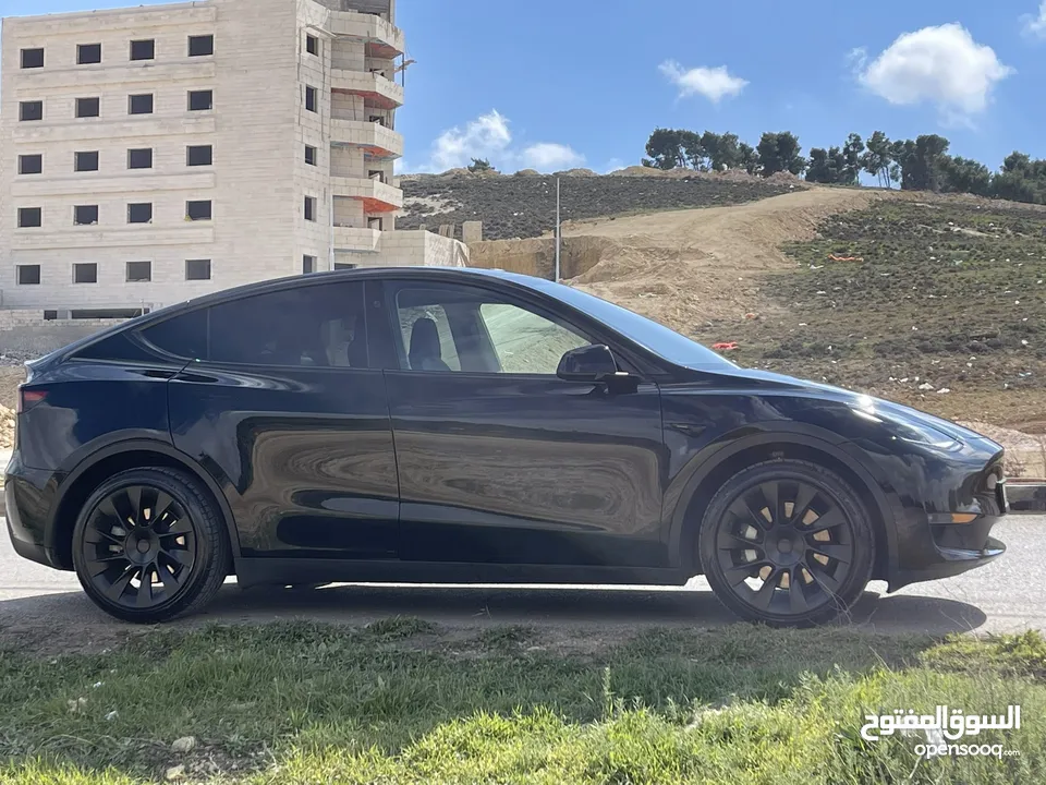 Tesla model y 2023 long range Dual motor  فحص اوتوسكور b+ 80 السيارة وكالة  السيارة 7 مقاعد