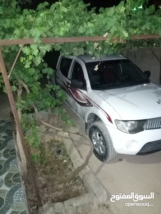 بك اب متسوبيشي   l200 موديل 2009 فور ويل 4X4