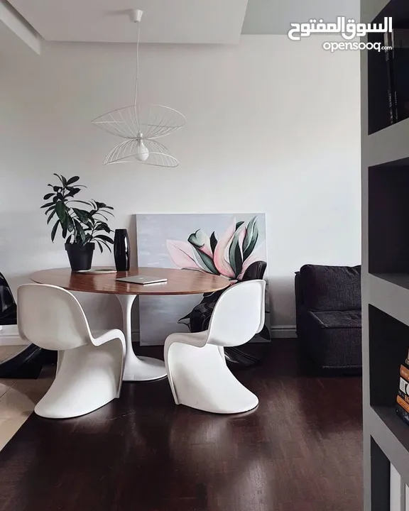 4 White Authentic Verner Panton (by Vitra) Chairs.