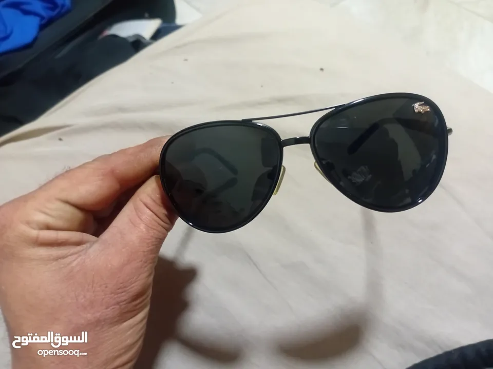 نظارة لاكوست استخدام خفيف  أصلية بحالة ممتازة