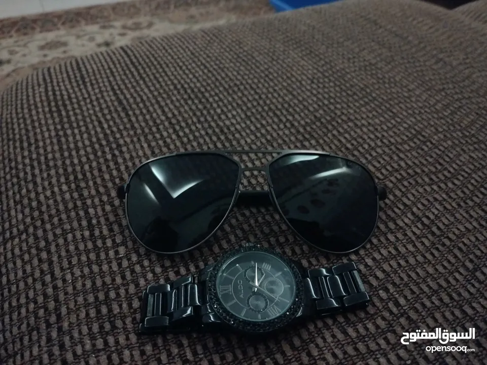 ساعةALDO لم يتم فتحه و نظاره شمسيه من PORSCHE نضيفه مافيه شامخ
