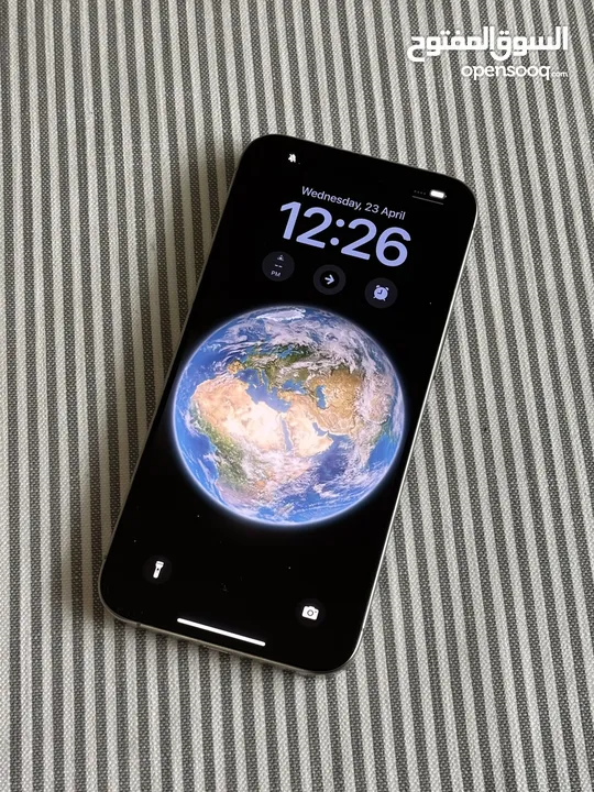iPhone 15 bro Max natural titanium 256 GB used like a new
