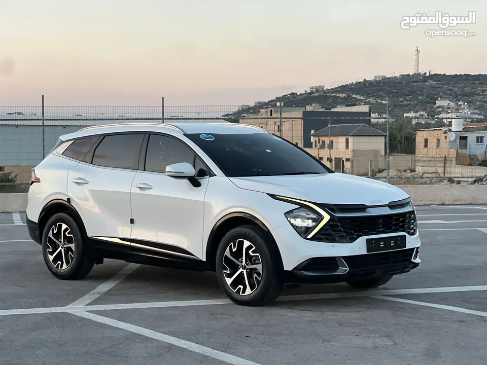 كايا سبورتاج /2022 فل بدون فتحة سقف  2x4 ///240Hp بنزين + كهرباء  ( Haybrid) 1600cc