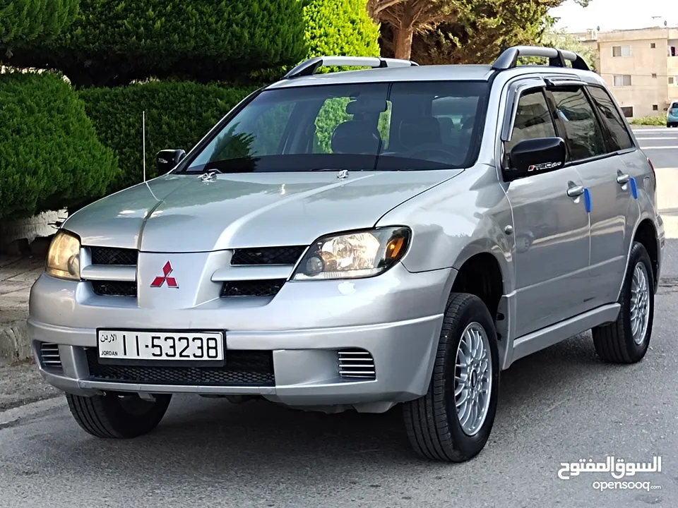 ميتسوبيشي آوتلاندر اوتوماتيك 2003 توب نظافة بسعرررر مميززز محرك 2400cc