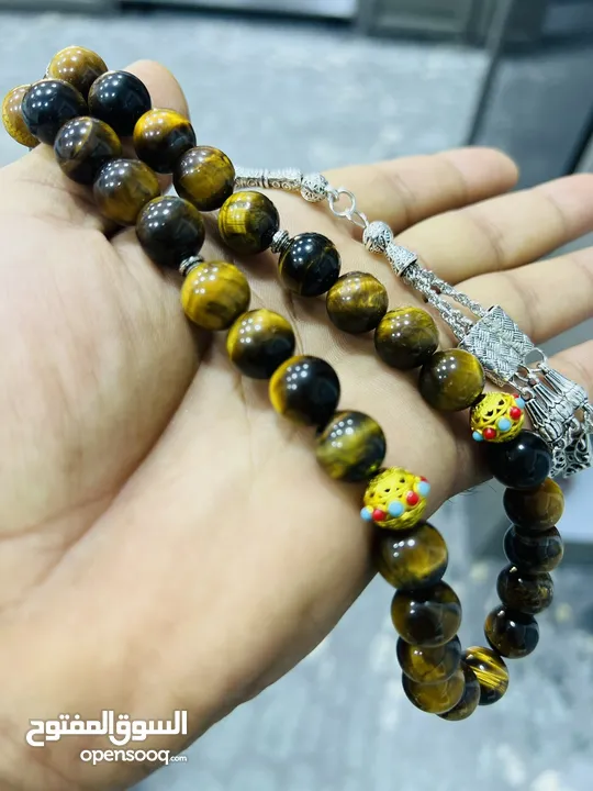 عرض خاص سبحه عين النمر ازرق او ذهبي بسعر حرق 33 حبة حلوة مش صغيرة للعلم مع طقم انتيومون مرتب