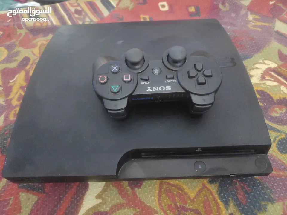 PS3 Slim (بلاستيشن 3 سليم) مُهكَّر 150GB + يد أصلية + 11 لعبة