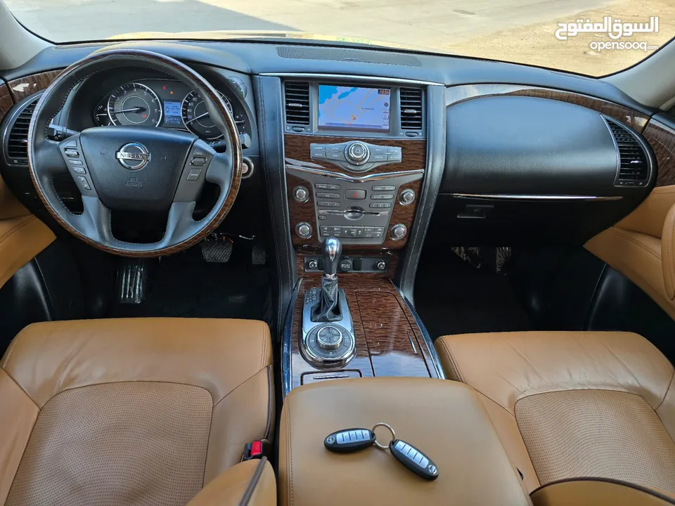 Nissan platinum SE320 V8 GCC 2014 Price 69,000 A