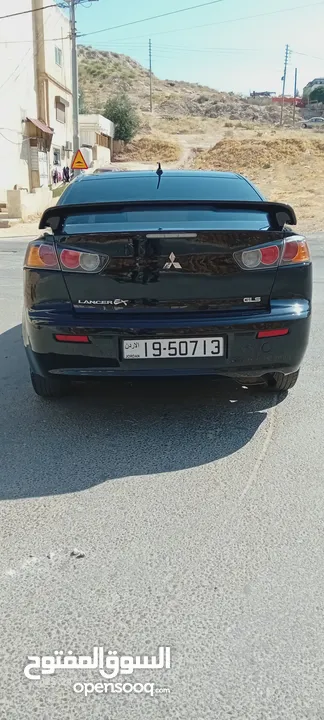 متسوبيشي لانسر فراشة موديل 2015 فحص مرفق مع الصور بحالة الوكاااااالة  ماشية 49 الف km  أصلي