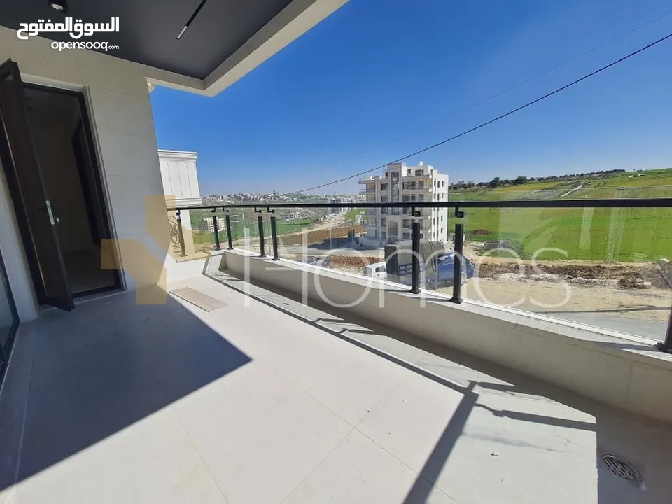 شقة طابق اول للبيع في رجم عميش - حجرا، بمساحة بناء 200م