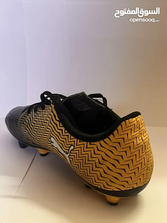 Unisex Puma kids football shoes (yellow) -  حذاء اطفال لون اصفر لكرة القدم (صالح للجنسين)