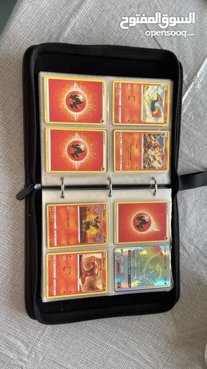 Pokémon card holder, with 15 trainers, 85 Pokémon cards,12 energy cards, a total of 112 Pokémon car