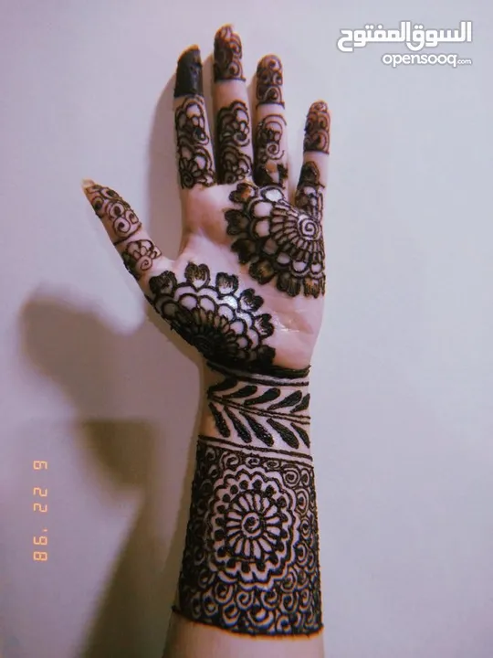 Putting hand henna
