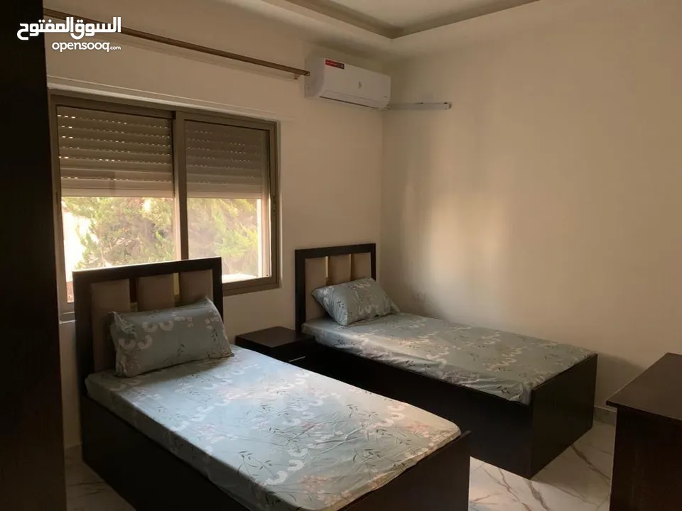 شارع الجامعة - شقة مفروشة ارضي غرفتين شامل المياه والإنترنت للإيجار من المالك مباشرة