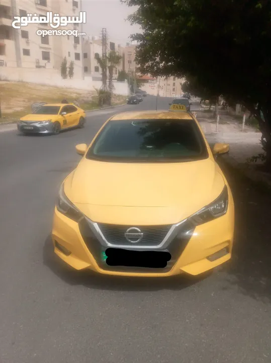 نيسان صني 2021 اتوماتيك تكسي عمان طبعه حره فحص كامل ترخيص لشهر2/2026 طالع من وكالة نيسان قي2021 فحص