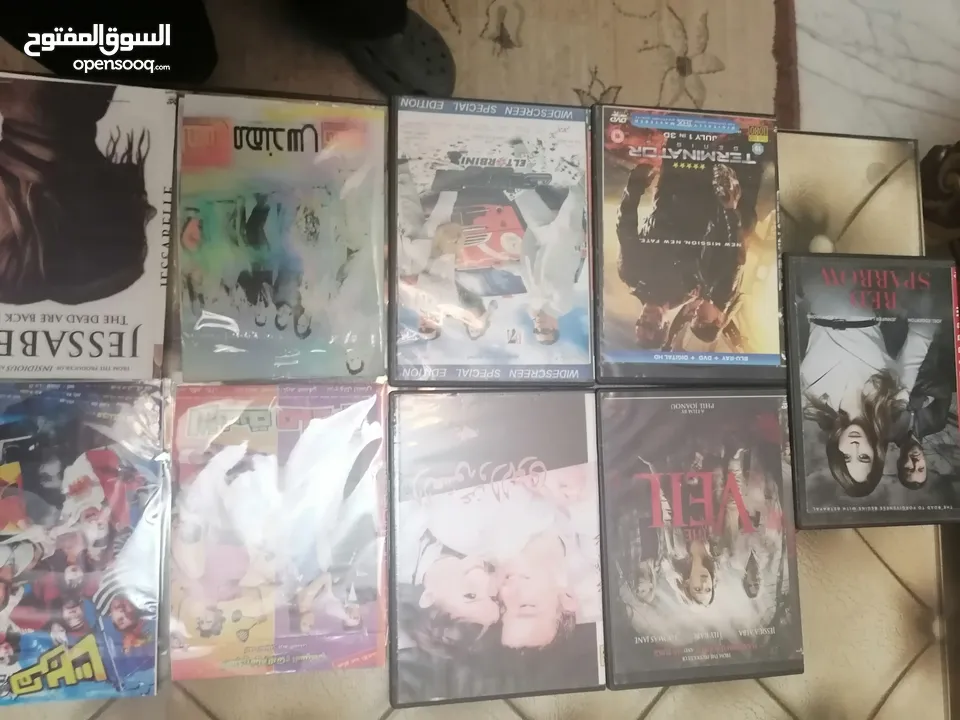 ب5 دنانير DvD جهاز مع رموت و 32 فلم سيدي ديفيدي