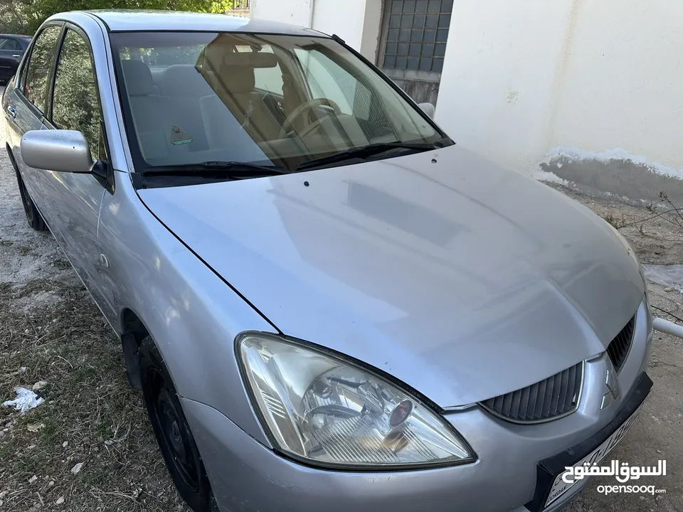 لانسر موديل 2004 ماتور 1600 فحص مرفق