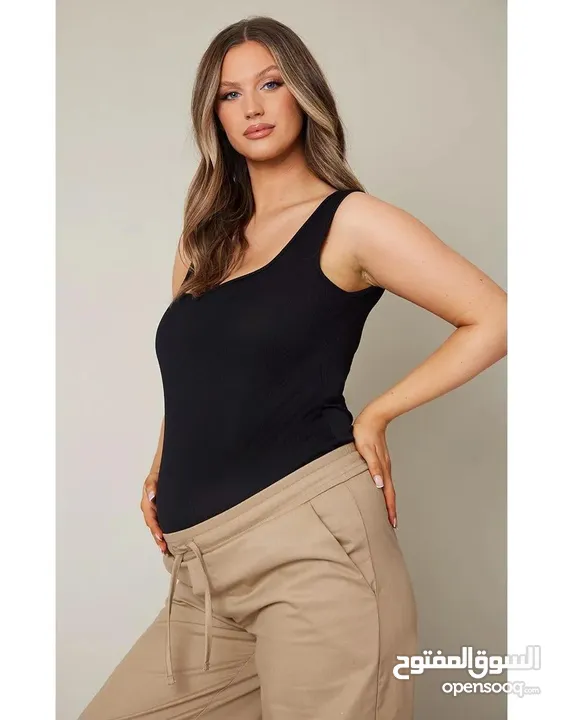 Top Basic Lama Moda Beirut  size: L - XL لون : اسود   قماشة لكل الفصول ( صيف ، ربيع ، خريف ، شتاء )