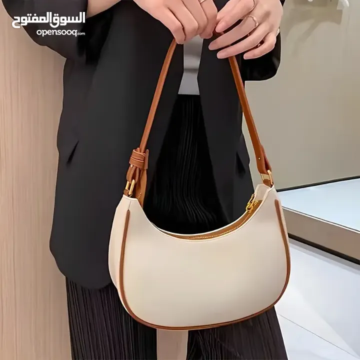 حقيبة يد فرنسية فاخرة - تصميم نصف قمر بسحاب عملي – لون بيج أنيق