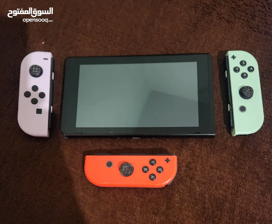 نينتندو سويتش مع 5 العاب وأيد و شاحن