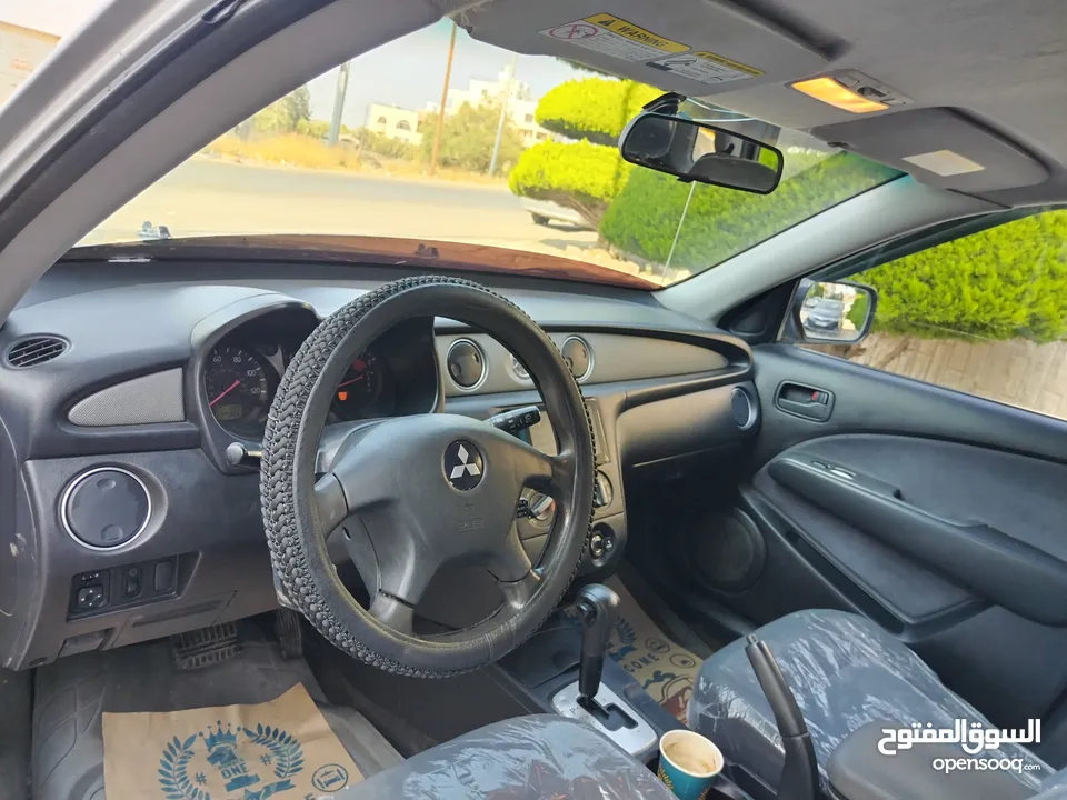ميتسوبيشي آوتلاندر اوتوماتيك 2003 توب نظافة بسعرررر مميززز محرك 2400cc