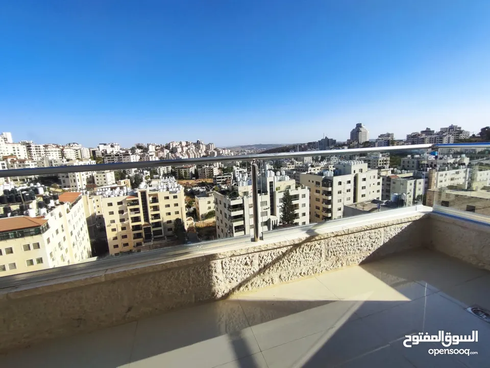 شقة بإطلالة عالية في قلب عين منجد – فرصة لا تعوّض