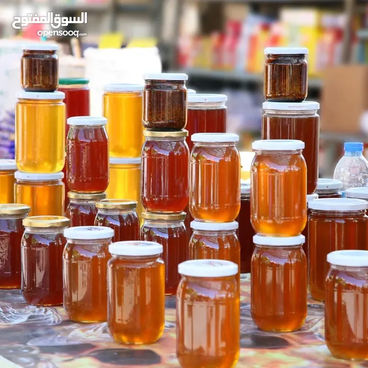 عسل طبيعي 100%  العسل الطبيعي الفاخر الابيض القرغيزي والأسود والأحمر وغذاء الملكات