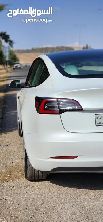 Tesla Model 3 Standerd Plus 2022 ابيض وداخليه ابيض جمرك جديد شهر 12‎ بسعر 20 الف بدون الرقم