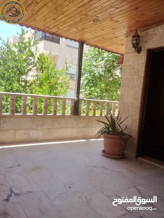 شقة أرضية مميزة للبيع في الرابية  - قرب كامبردج 190م مع حديقة وترسات بسعر مغري