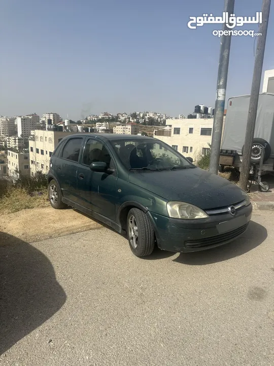 كورسا اوتمات 2003